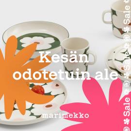 Vihreävalkoisia Marimekon Unikko-astioita